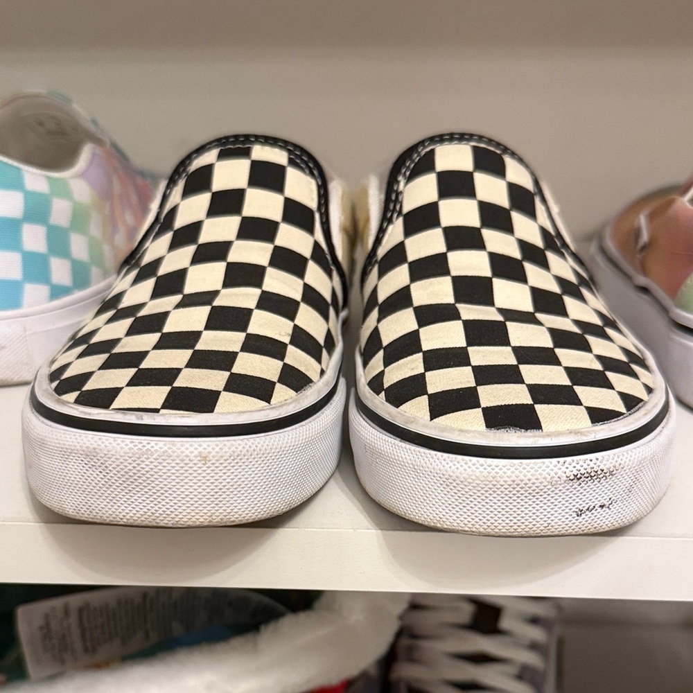 Vans Black and Cream Checkered Slip-Ons